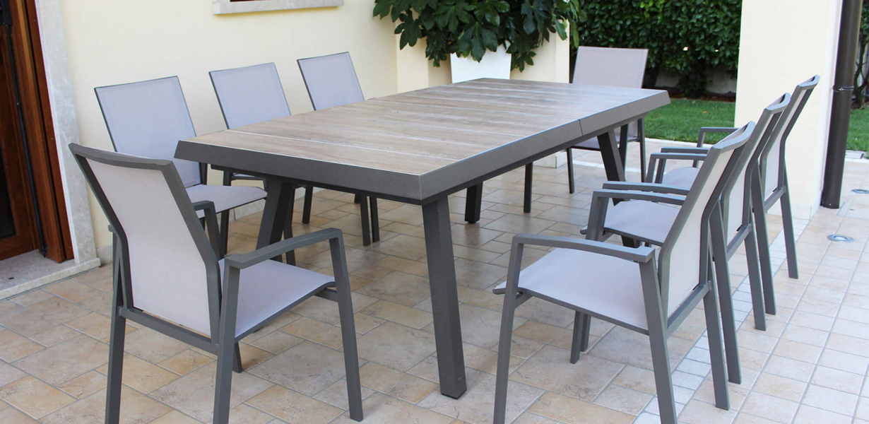 Tavolo allungabile moderno da esterno , tavoli allungabili da esterno, tavolo in gres, arredo giardino Bergamo, Rota Commerciale Bergamo, Giardinaggio Bergamo